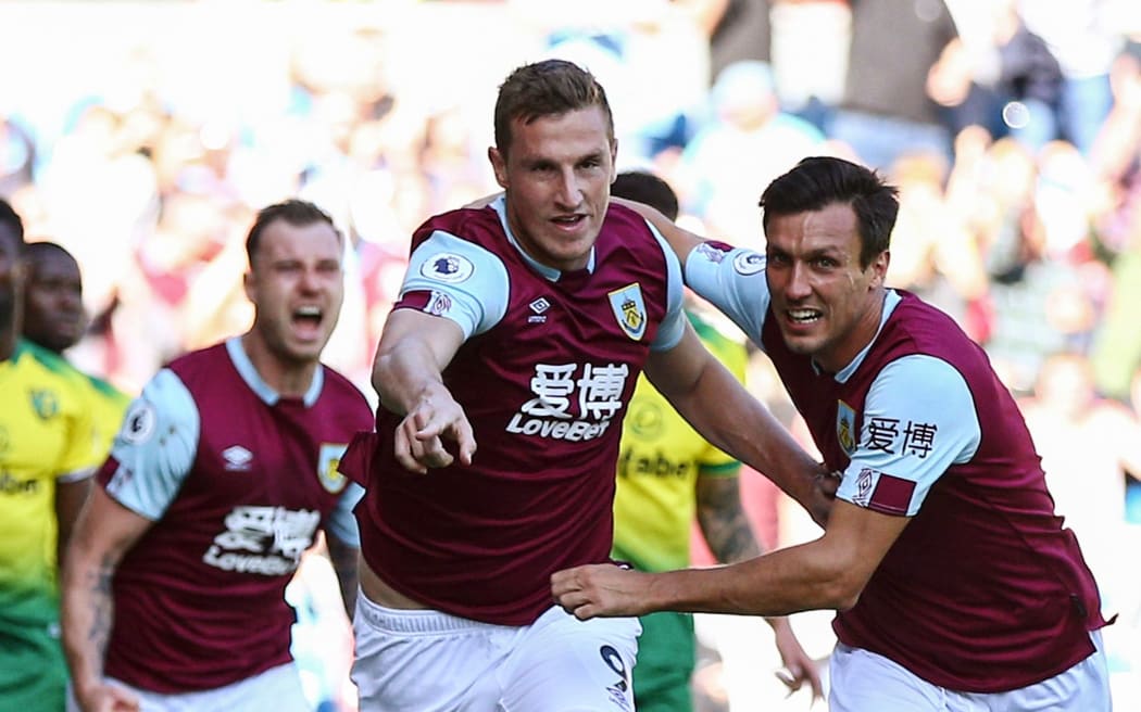 Chris Wood of Burnley runs to celebrate scoring a goal.