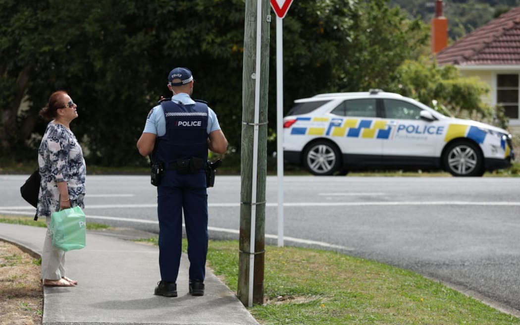 Police on the scene amid a stand-off with an armed man in Lower Hutt, 27/02/2024.