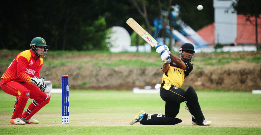 Sese Bau sweeps the ball