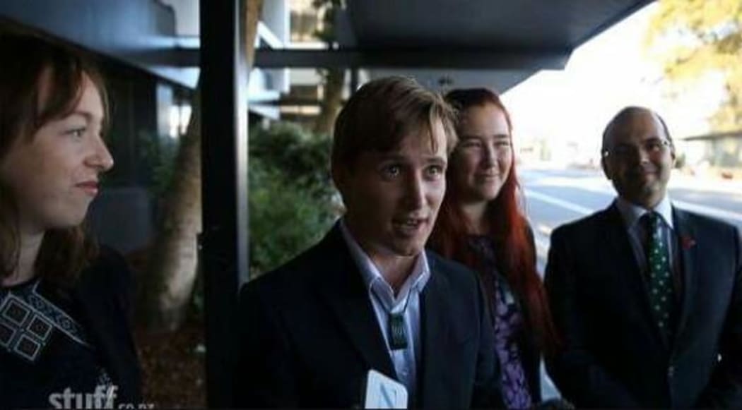 Michael Tavares (centre) posted this photo on Twitter, captioned "second appearance in Waitakere District Court".