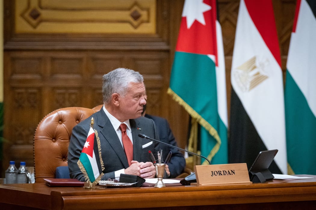 Image released by the Jordanian Royal Palace on September 2, 2021 showing Jordan's King Abdullah II meeting with the Palestinian and Egyptian presidents during a trilateral summit in Cairo.