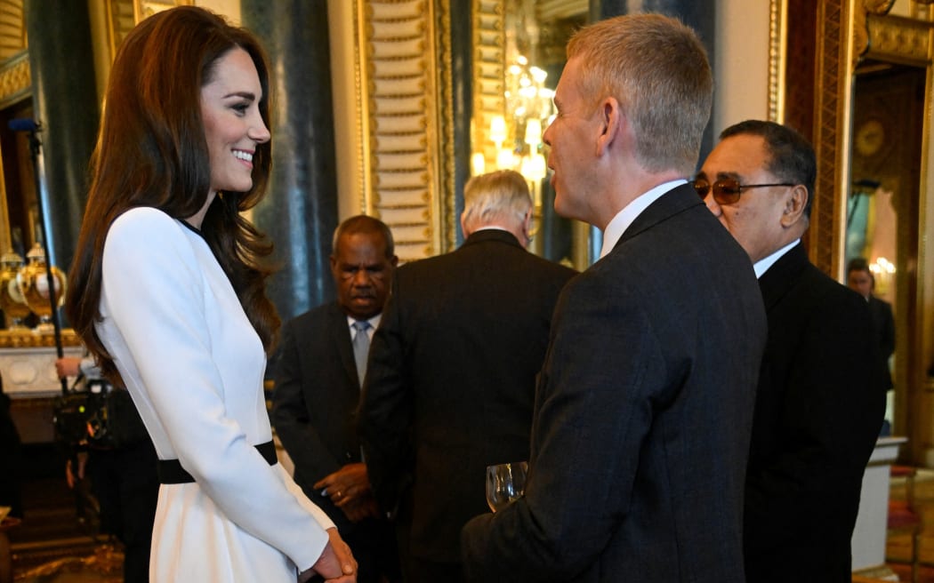 Britain's Catherine, Princess of Wales (L) and New Zealand Prime Minister Chris Hipkins attend a Realm Governors General and Prime Ministers Lunch, at Buckingham Palace in London on May 5, 2023, ahead of the coronation weekend. (Photo by TOBY MELVILLE / POOL / AFP)