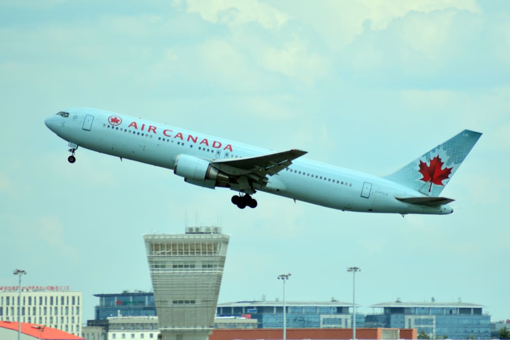 111127053 - warsaw, poland. 26 july 2018. airplane c-ftca air canada boeing 767-375 (er) taking off from the warsaw chopin airport.