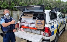 A Police vehicle packed with food boxes in Maungaturoro - Senior Constable Llew Smart in Maungaturoto has also been handing out food boxes in his area along with messages of support and help with information where required.