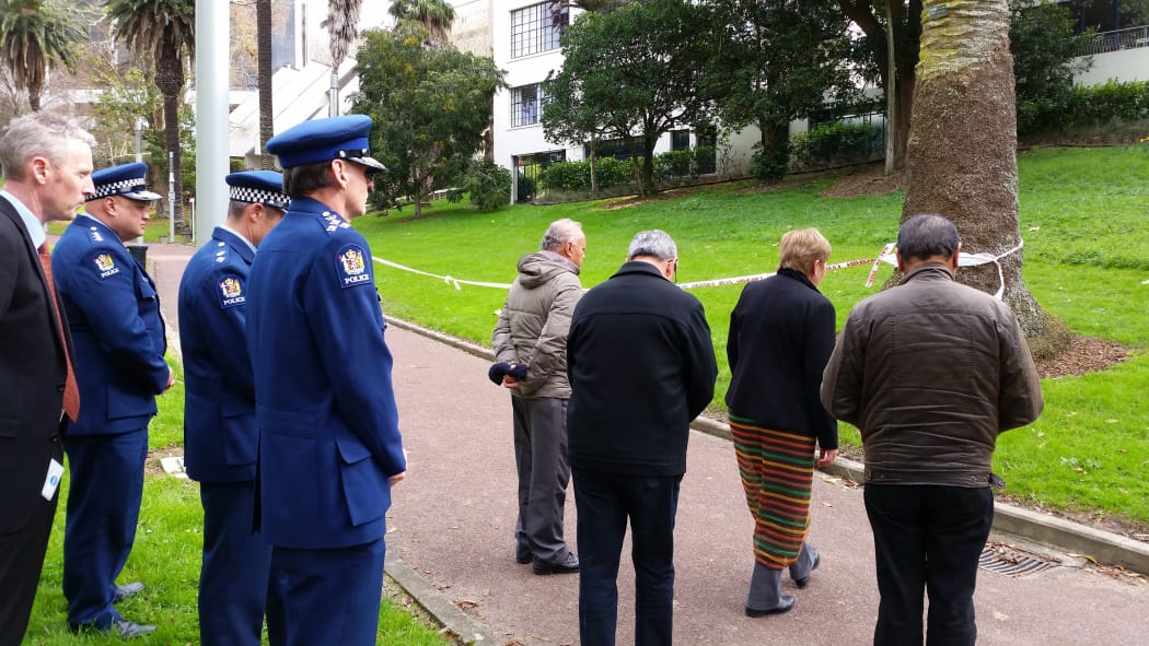 Police and members of the public at Myers Park on Tuesday.