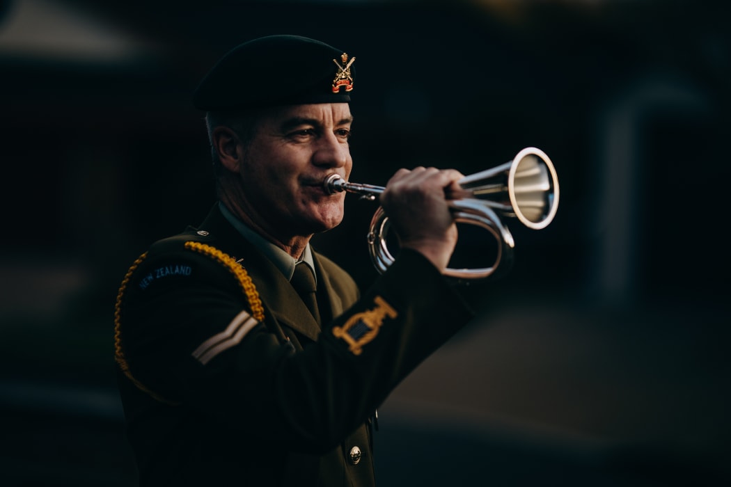 Tim Cook playing the bugle.