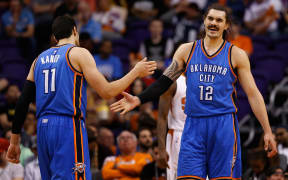 Steven Adams and his Oklahoma City Thunder teammate Enes Kanter.