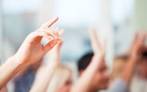 kids with hands up