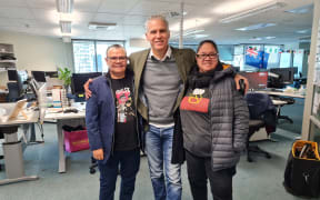 A photo of First People artists Dr r e a and Christopher Pease with Ever Present curator Tina Baum.