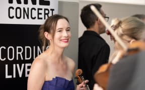 violinist Monique Lapins backstage at the Adam Chamber Music Festival