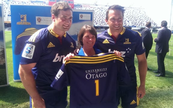 Vice-Chancellor Harlene Hayne with Craig Millar, left, and co-captain Ben Smith.