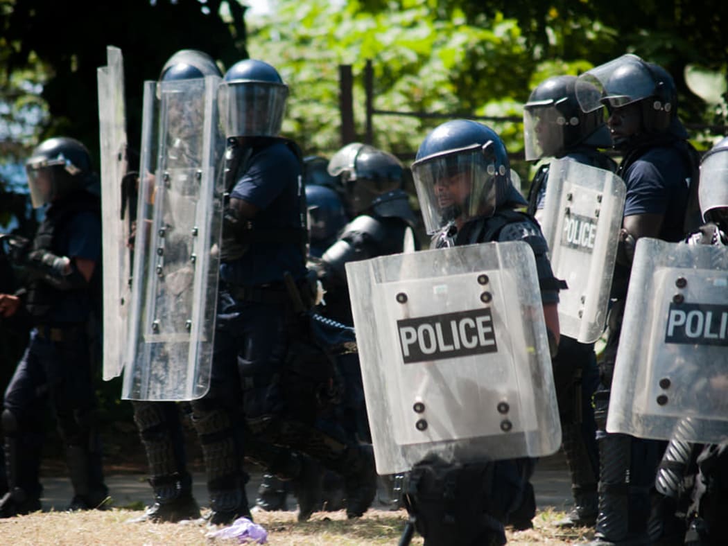 Police deployed to deal with the rioting in Honiara