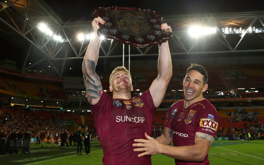 BRISBANE, AUSTRALIA - JULY 12:  Cameron Munster and Billy Slater of the Maroons celebrate victory after game three of the State Of Origin series between the Queensland Maroons and the New South Wales Blues at Suncorp Stadium on July 12, 2017 in Brisbane, Australia.  (Photo by Mark Kolbe/Getty Images)