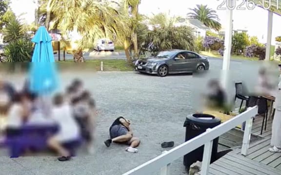 Dallas Gurney was pushed off the deck of his Whananaki Store from behind.