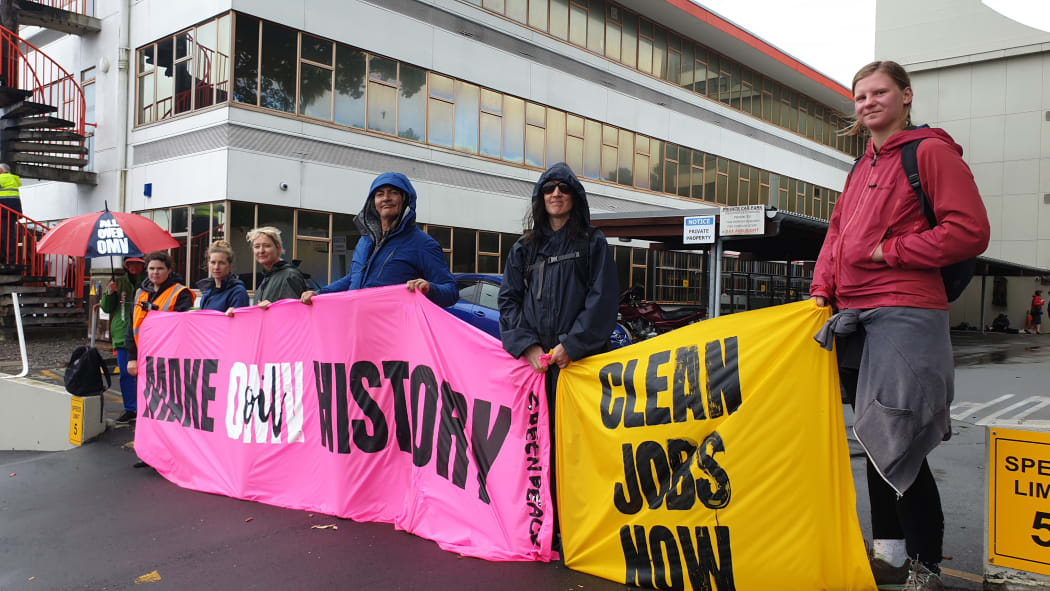 Protesters outside the OMV offices in New Plymouth on Monday 2/12/19.