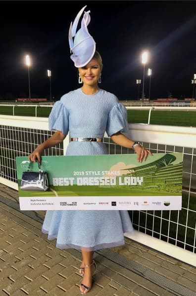 A best dressed winner wears a hat from Monika Neuhauser, a milliner based in the Waikato.