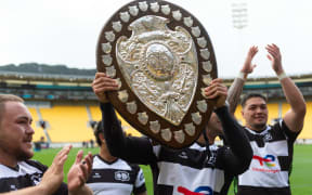 Jonah Lowe of Hawke's Bay holds the Ranfurly Shield.