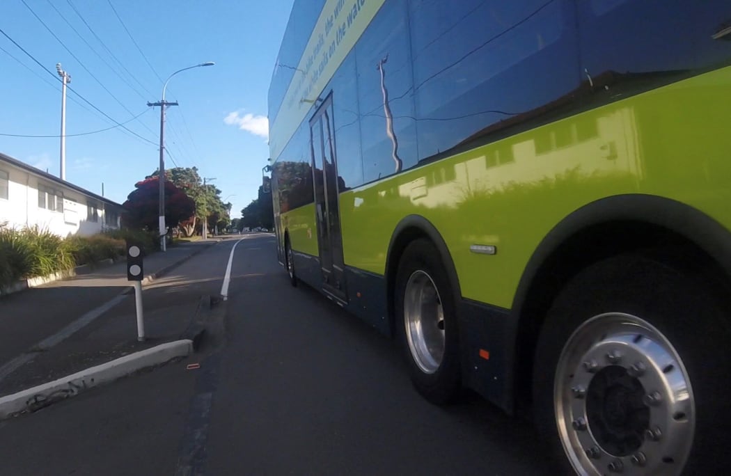 Bus close to cyclist