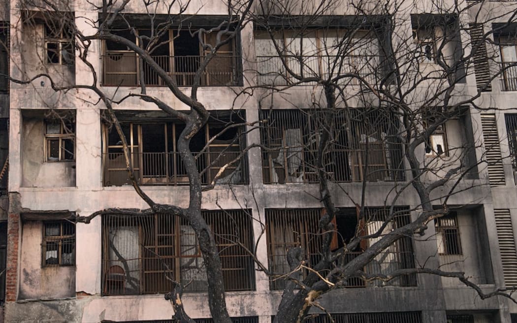 A month on from the fatal Air India Flight 171 crash in Ahmedabad, the site of the collision remains blackened.