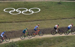 Riders compete in the cycling mountain bike men's cross-country race at the Rio Olympics.