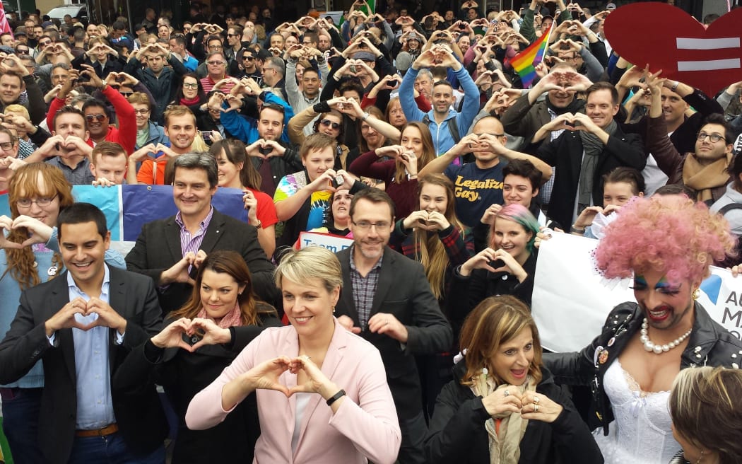 Demonstrators including Deputy Labor leader Tanya Plibersek and Greens Senator Sarah Hanson-Young take part in a marriage equality rally in Sydney on Sunday, 31 May 2015.