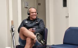 Green Party candidate Efeso Collins hitting the phones.