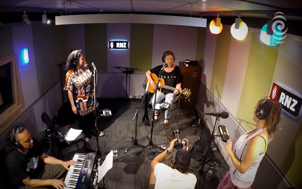 Debbie Harwood and Shona Laing singing 'Show Your Love'.