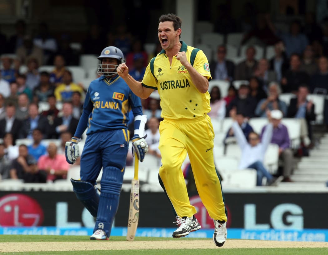 Clint McKay celebrates the dismissal of Kumar Sangakkara during the ICC Champions Trophy fixture between Australia and Sri Lanka in London in 2013.