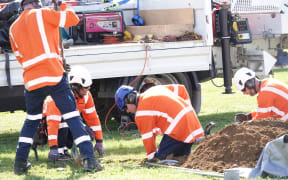 Annual Connection competition's line mechanic teams were digging Earth banks for equipment.