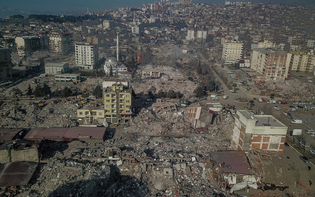 Collapsed buildings during ongoing rescue operations in Kahramanmaras, southeastern Turkey, on February 14, 2023, eight days after a 7.8-magnitude quake struck the country's southeast.