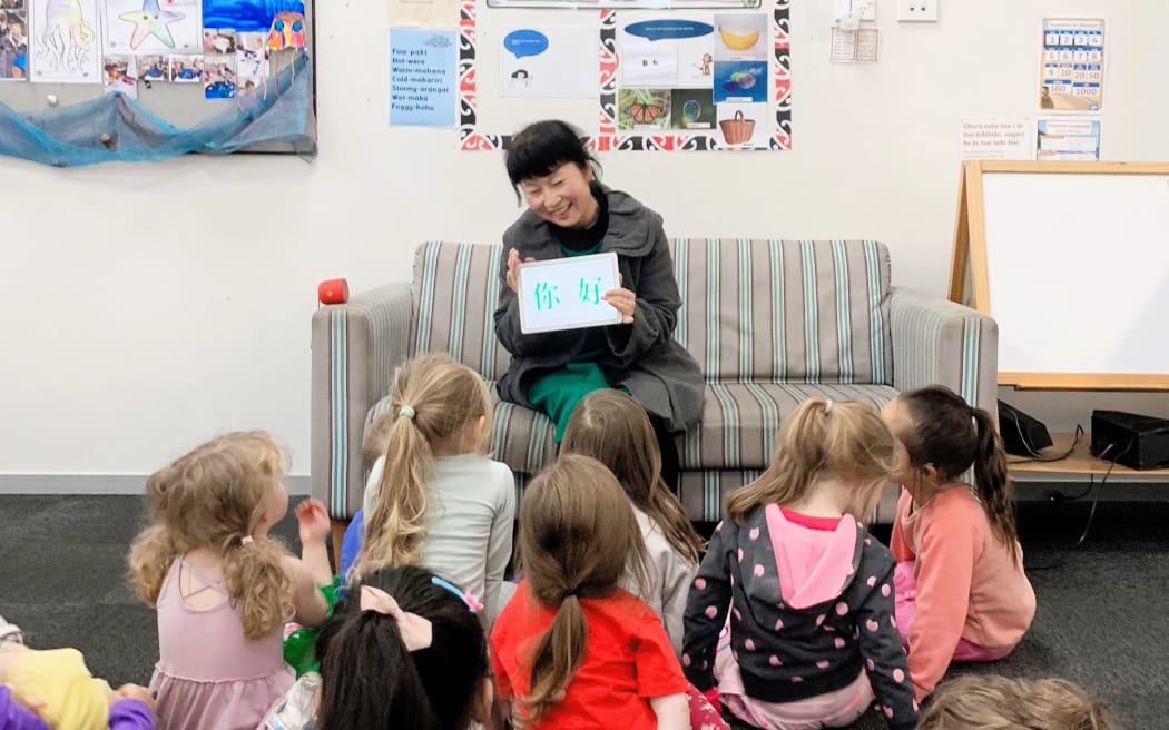 Lily Zhang teaches Chinese to students in Christchurch in September 2024.