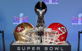 LAS VEGAS, NEVADA - FEBRUARY 05: A general view of the Vince Lombardi Trophy with the San Francisco 49ers and Kansas City Chiefs helmets during a press conference ahead of Super Bowl LVIII at Allegiant Stadium on February 05, 2024 in Las Vegas, Nevada.   Ethan Miller/Getty Images/AFP (Photo by Ethan Miller / GETTY IMAGES NORTH AMERICA / Getty Images via AFP)