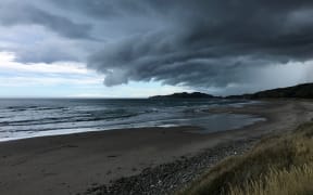 Storm clouds in Tuahine point at Wainui Beach, Gisborne.