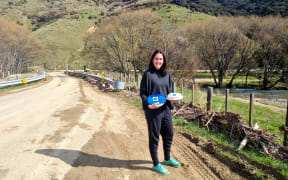 Melissa Woodhouse with some of the care packages being delivered in Cable Bay.