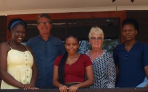 New Zealanders Graeme and Gillian Bremner with members of their Self Drive Tours Botswan team.