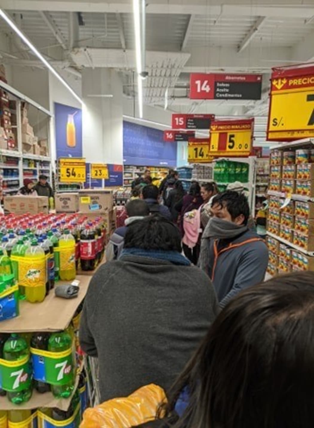 Supermarket queue in Puno in Peru where New Zealanders Holly Bates and her partner Karl Damon are stranded.