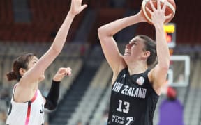 Esra McGoldrick of New Zealand shoots the ball during a match against Japan at the Asia Cup, in south China's Shenzhen on 18 July, 2025.