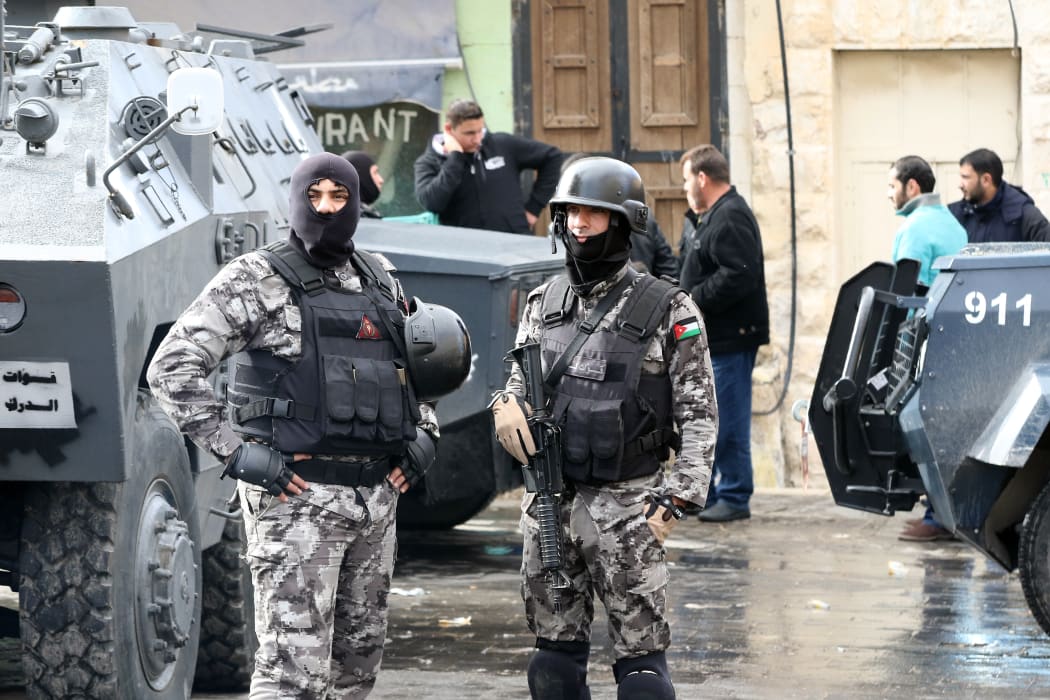 Jordanian security forces in Karak, a day after the initial shooting that left 10 people dead.