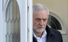 Britain's main opposition Labour Party leader Jeremy Corbyn leaves his home in London on February 19, 2019. - Seven MPs quit Britain's main opposition Labour Party on Monday. (Photo by Daniel LEAL-OLIVAS / AFP)