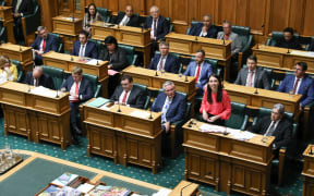 Prime Minister Jacinda Ardern acknowledges the press gallery during the adjournment debate at Parliament