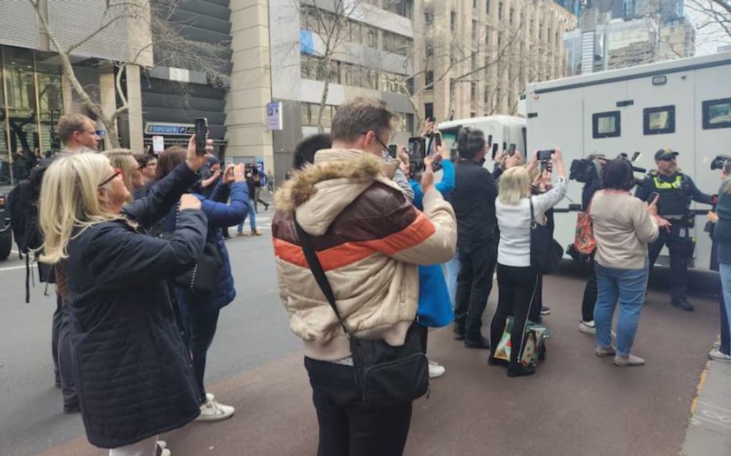 Members of the public chased the prison van holding Erin Patterson as it left the Supreme Court on Monday.