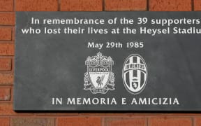 A memorial plaque in remembrance of the 39 supporters who lost their lives in the Heysel Disaster of 1985.
