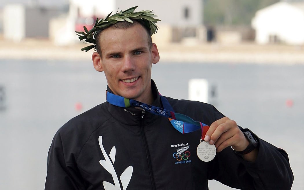 New Zealand's Ben Fouhy shows off his silver medal 2004 Athens Olympics.