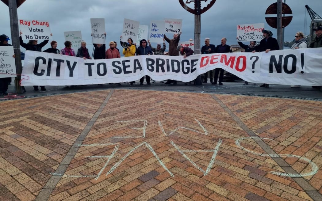 A protest of about 40 people on the City to Sea Bridge in Wellington protesting the demolishing the bridge.
