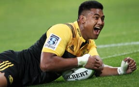 Julian Savea celebrates his hat-trick.