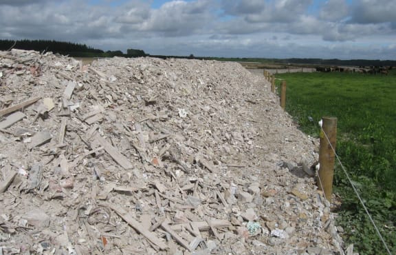 Contaminated waste used to form a track at Coutts Island.