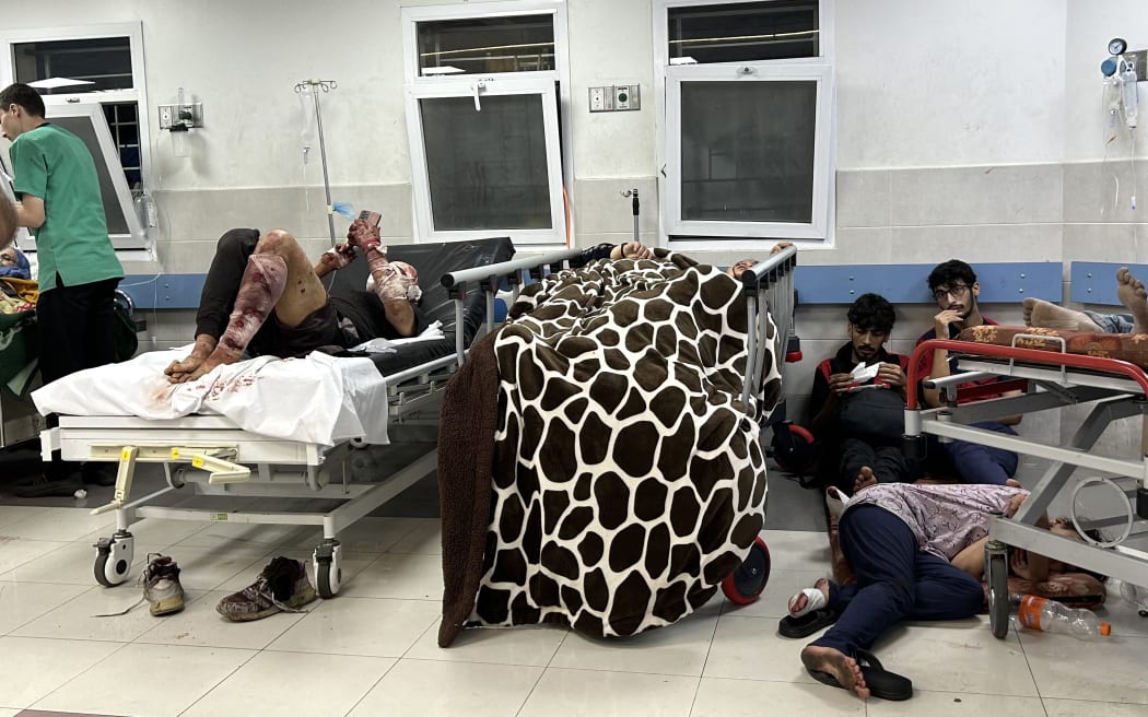 Patients rest at Al-Shifa hospital in Gaza City on November 10, 2023, amid ongoing battles between Israel and the Palestinian Hamas movement. Heavy fighting was raging near Al-Shifa hospital, with Israel saying it had killed dozens of militants and destroyed tunnels that are key to Hamas's capacity to fight. Israel launched an offensive in Gaza after Hamas fighters poured across the heavily militarised border on October 7, killing 1,400 people, mostly civilians, and taking around 240 hostages. (Photo by AFP) / “The erroneous mention[s] appearing in the metadata of this photo  has been modified in AFP systems in the following manner: [Removing Byline]. Please immediately remove the erroneous mention[s] from all your online services and delete it (them) from your servers. If you have been authorized by AFP to distribute it (them) to third parties, please ensure that the same actions are carried out by them. Failure to promptly comply with these instructions will entail liability on your part for any...