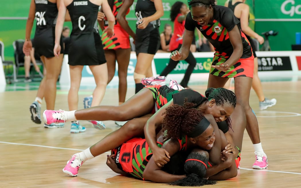 Malawi celebrate their upset win over the Silver Ferns at the Gold Coast Commonwealth Games.