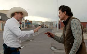 Joaquin Phoenix and Pedro Pascal in Eddington.