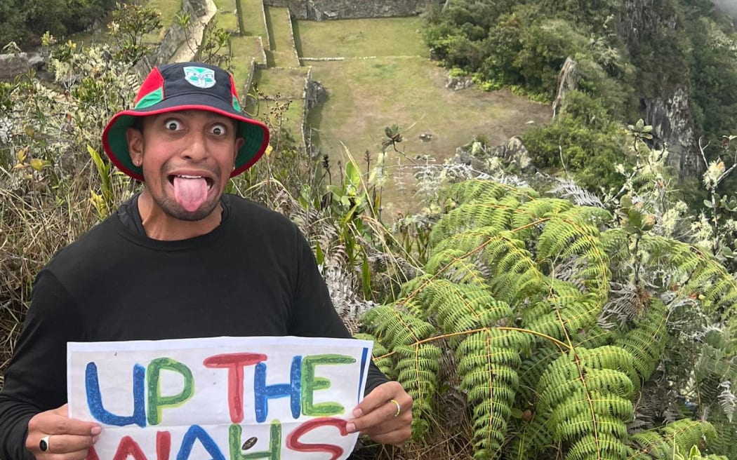 Warriors fan Zeb Laqekoro up Machu Picchu